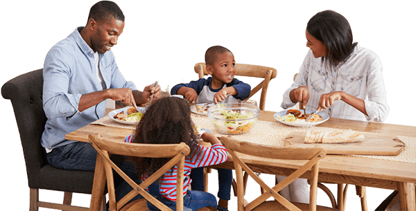 Family eating a meal together Family eating a meal together